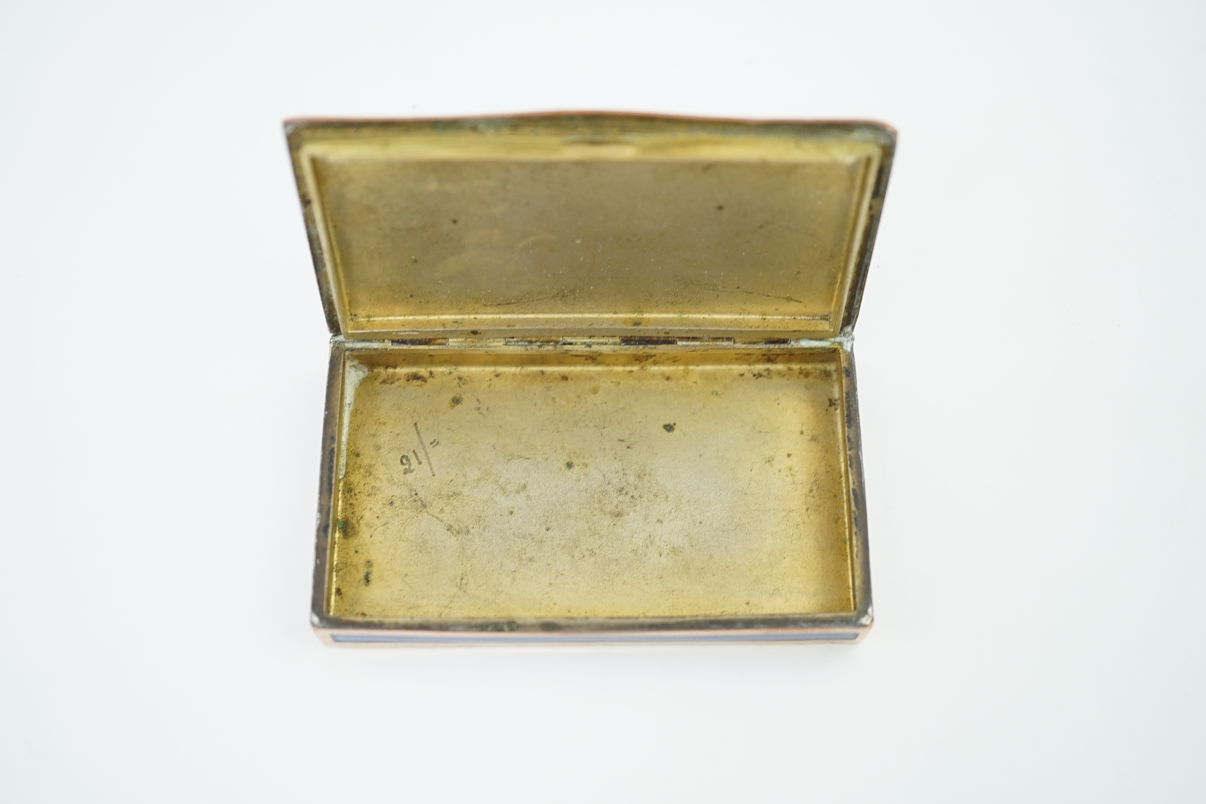 Two early 20th century enamelled white and gilt metal cigarette cases and a snuff box